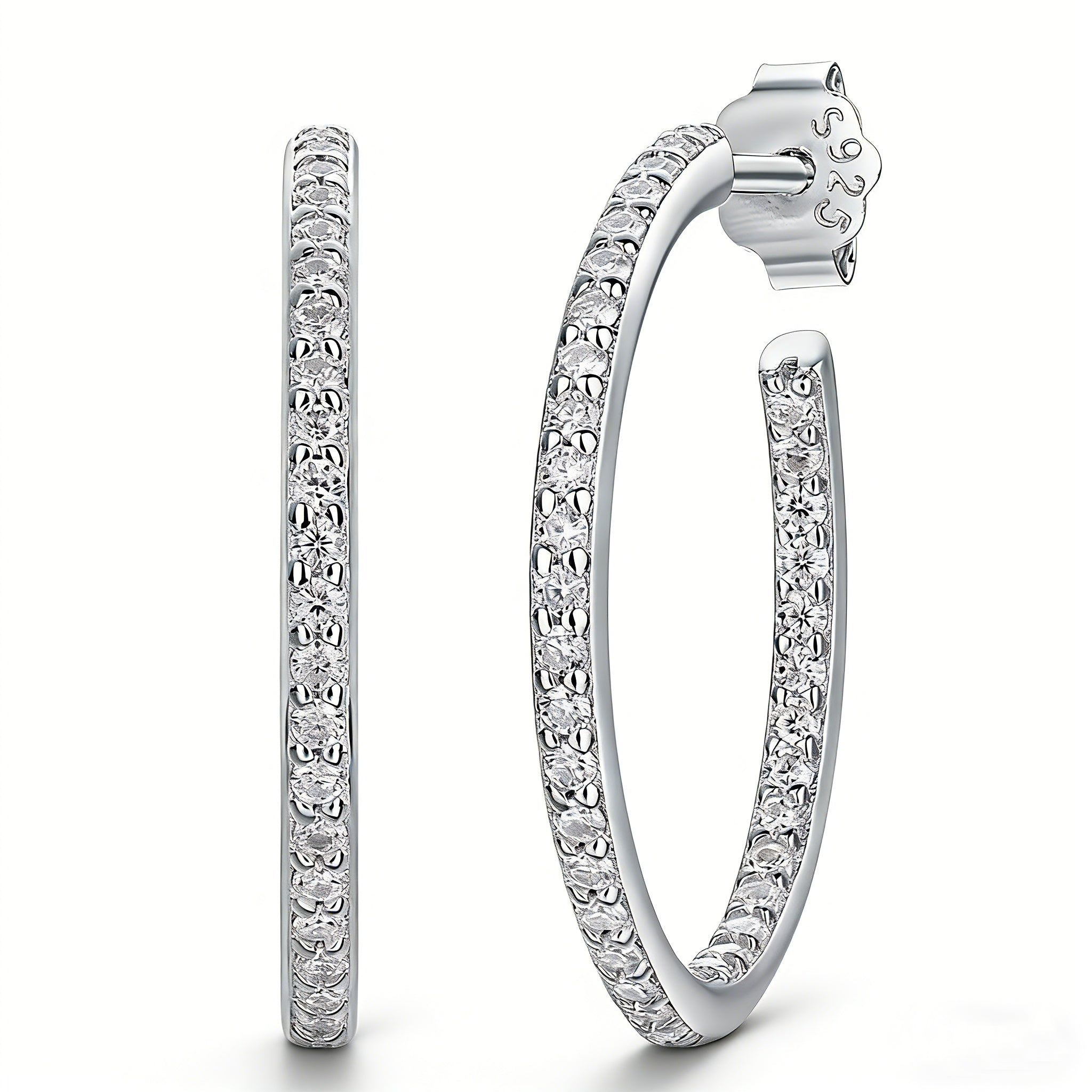 These 925 sterling silver hoop earrings are elegantly lined with sparkling moissanite stones along their entire length, creating a continuous, luminous sheen. The sleek, open-hoop design is secured with a classic butterfly back, blending timeless elegance with modern sophistication. The polished silver finish enhances the brilliance of the moissanite, making them a versatile accessory for both everyday wear and special occasions.