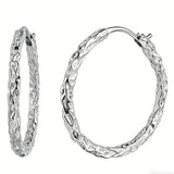 These S925 sterling silver hoop earrings feature a textured, molten lava-like finish in a warm gold tone. The organic, uneven surface creates a rugged, handcrafted appearance, while the classic oval hoop shape adds a timeless, elegant touch to the design. The secure post-back closure ensures comfortable all-day wear.
