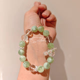 This is a bracelet consists of Xiuyan (Serpentine) Jade, Green Phantom Quartz, Clear Quartz, and 925 sterling silver accents, this gemstone bracelet blends timeless elegance with spiritual meaning.
