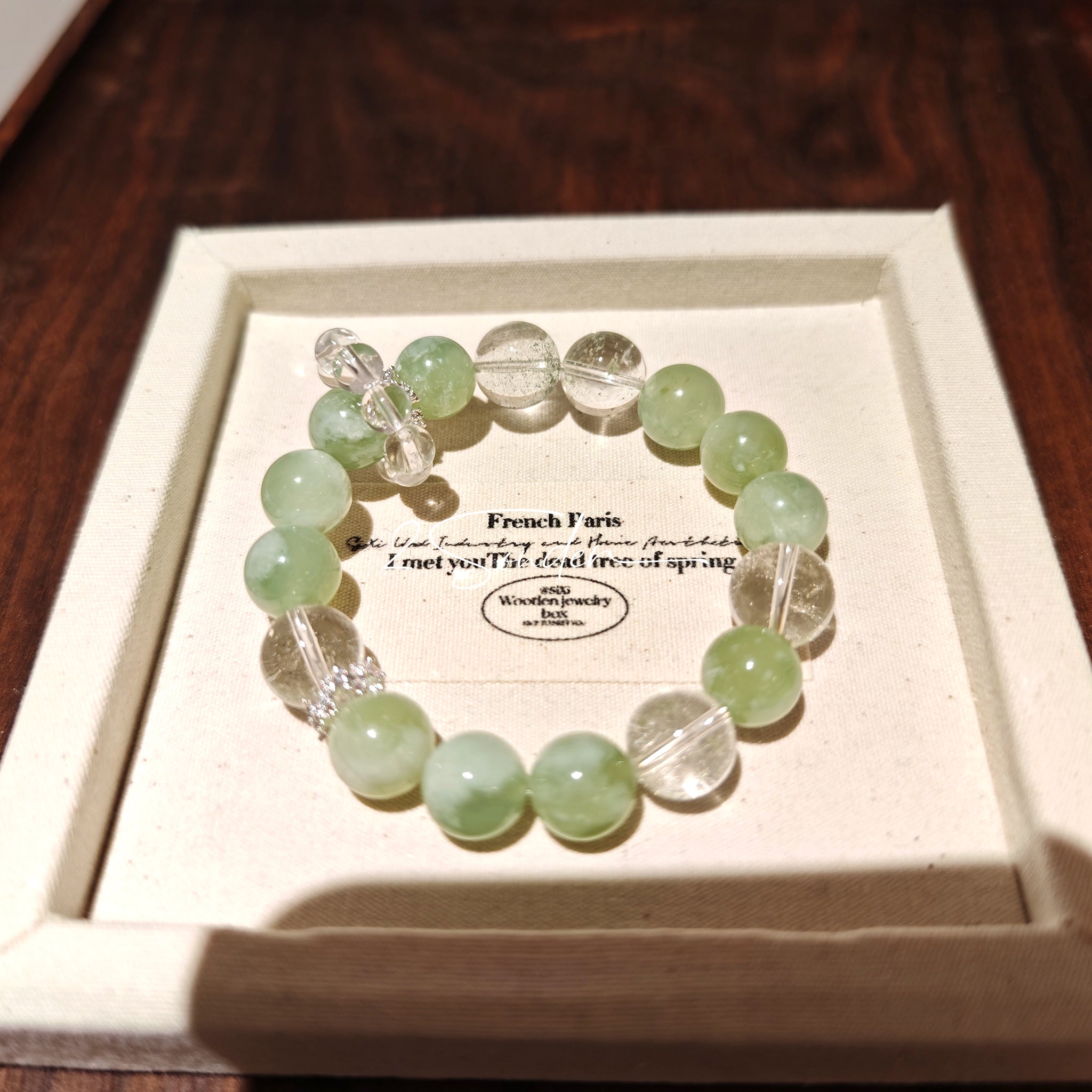 This is a bracelet consists of Xiuyan (Serpentine) Jade, Green Phantom Quartz, Clear Quartz, and 925 sterling silver accents, this gemstone bracelet blends timeless elegance with spiritual meaning.