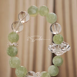 This is a bracelet consists of Xiuyan (Serpentine) Jade, Green Phantom Quartz, Clear Quartz, and 925 sterling silver accents, this gemstone bracelet blends timeless elegance with spiritual meaning.