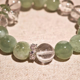 This is a bracelet consists of Xiuyan (Serpentine) Jade, Green Phantom Quartz, Clear Quartz, and 925 sterling silver accents, this gemstone bracelet blends timeless elegance with spiritual meaning.