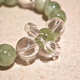 This is a bracelet consists of Xiuyan (Serpentine) Jade, Green Phantom Quartz, Clear Quartz, and 925 sterling silver accents, this gemstone bracelet blends timeless elegance with spiritual meaning.