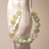 This is a bracelet consists of Xiuyan (Serpentine) Jade, Green Phantom Quartz, Clear Quartz, and 925 sterling silver accents, this gemstone bracelet blends timeless elegance with spiritual meaning.