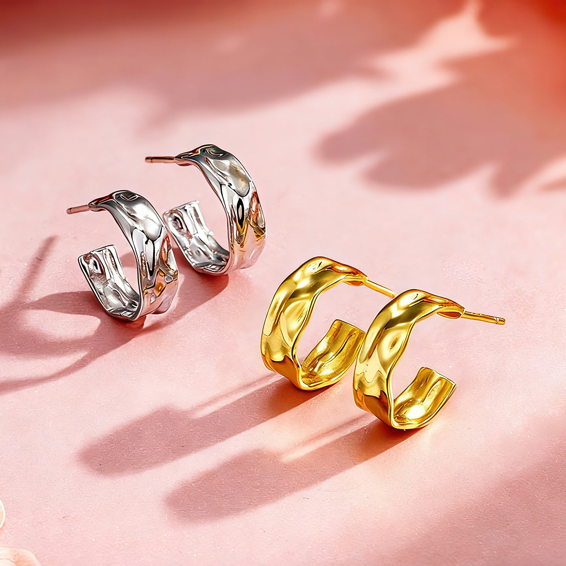 These sterling silver stud earrings are inspired by the natural, smooth folds of tin foil. Their surface texture resembles the wrinkles on tin foil, presenting a stunning sheen. The simple yet stylish design makes them versatile and practical, easily adding a touch of modern fashion to your everyday outfits.