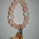 Blushing crystals flow into icy blue veins, topped with an amber star charm, sliding agate pearl, and graceful boho fringe.