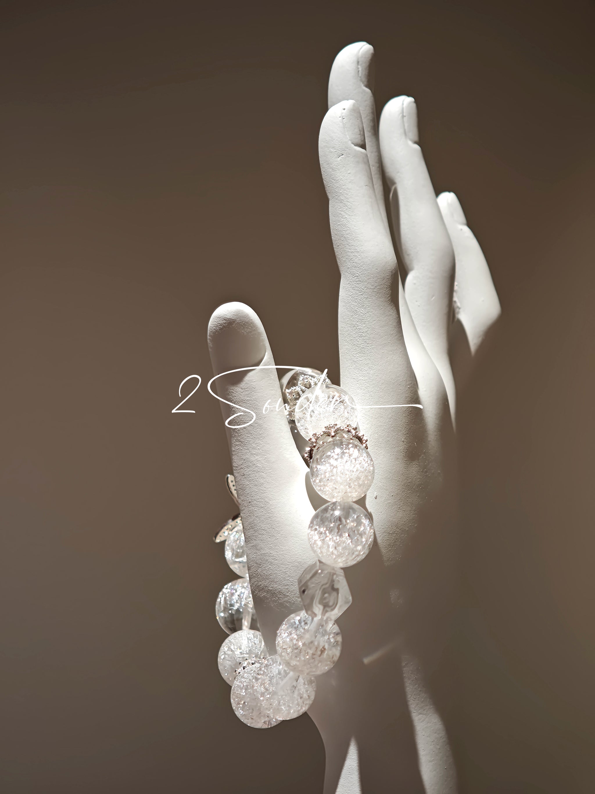 This is a crystal bracelet including white fireworks super seven clear quartzs, pure clear quartzs and raw clear quartz nuggets.