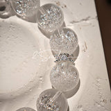 This is a crystal bracelet including white fireworks super seven clear quartzs, pure clear quartzs and raw clear quartz nuggets.