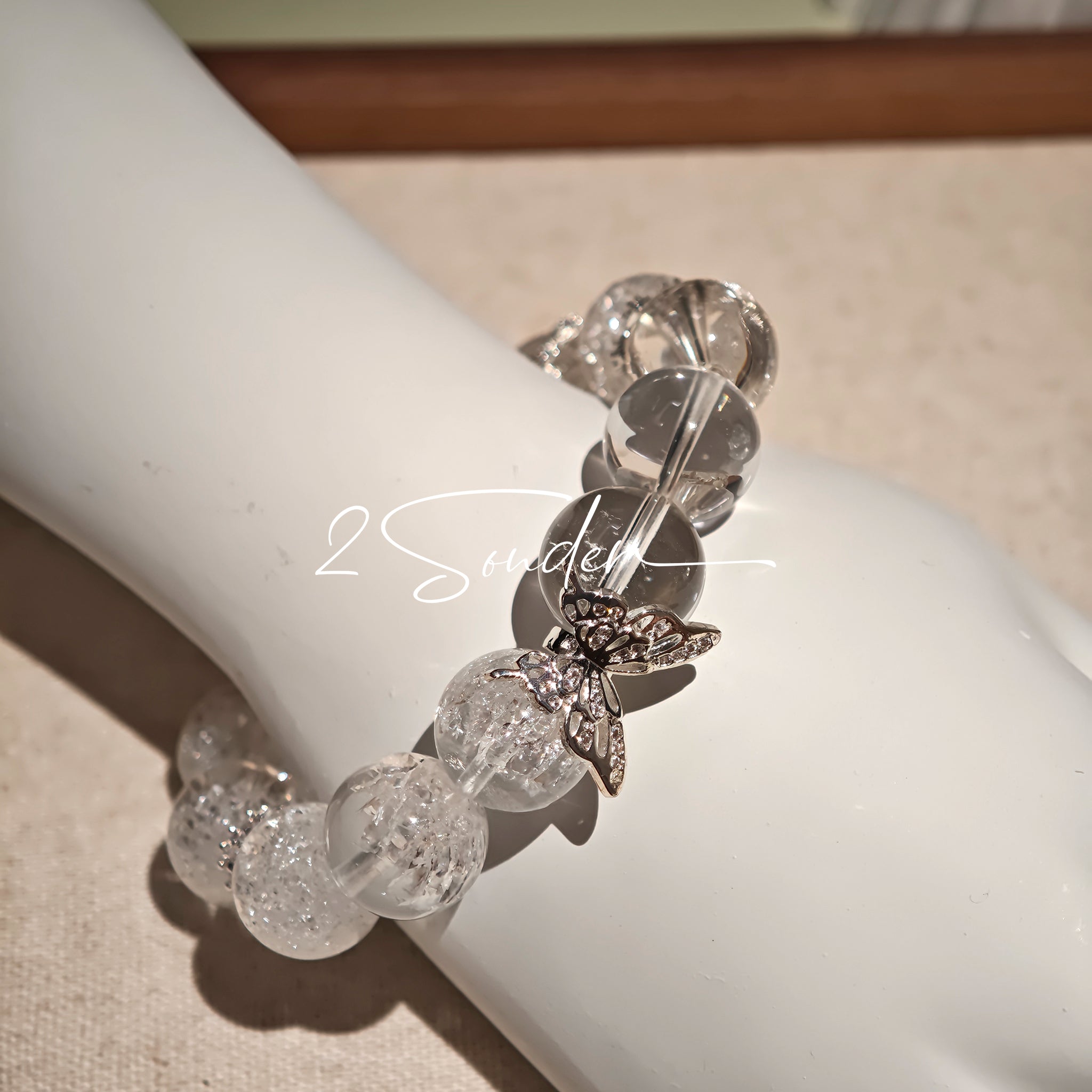 This is a crystal bracelet including white fireworks super seven clear quartzs, pure clear quartzs and raw clear quartz nuggets.