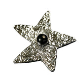 These vintage-style brooches come in star and Saturn-inspired planet shapes, with a hammered, textured finish in gold or silver tone. Each design is accented with a central gemstone, including pearl, red agate, or black onyx, adding a touch of celestial charm to any outfit.