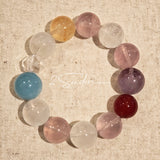 This is a multi gemstone bracelet consists of White Phantom Quartz, Aquamarine, Raw Clear Quartz, Starry Pink Quartz, and Lavender Amethyst.  The colors are close to pastel shades, making them perfect for spring and summer wear.