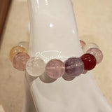 This is a multi gemstone bracelet consists of White Phantom Quartz, Aquamarine, Raw Clear Quartz, Starry Pink Quartz, and Lavender Amethyst.  The colors are close to pastel shades, making them perfect for spring and summer wear.