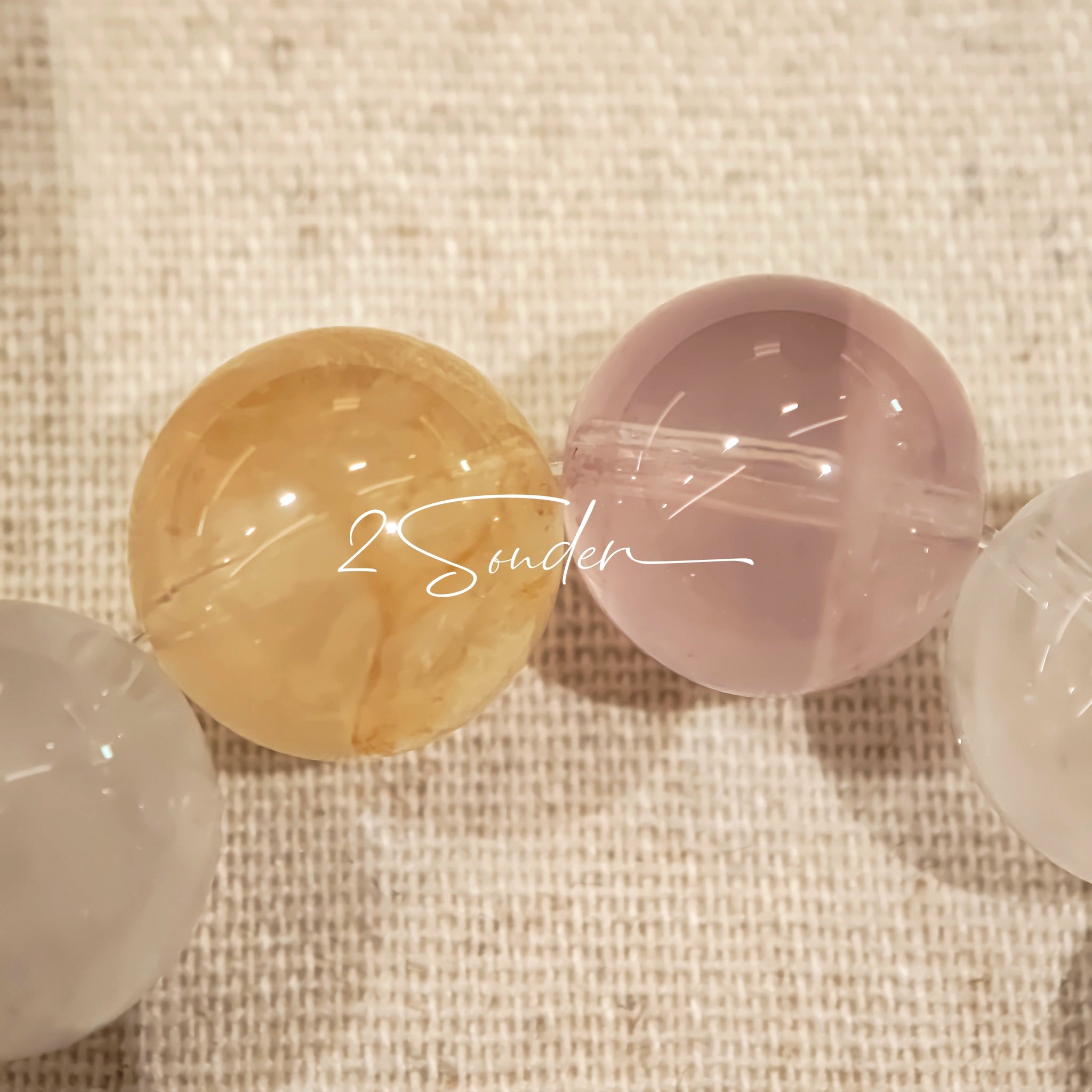 This is a multi gemstone bracelet consists of White Phantom Quartz, Aquamarine, Raw Clear Quartz, Starry Pink Quartz, and Lavender Amethyst.  The colors are close to pastel shades, making them perfect for spring and summer wear.