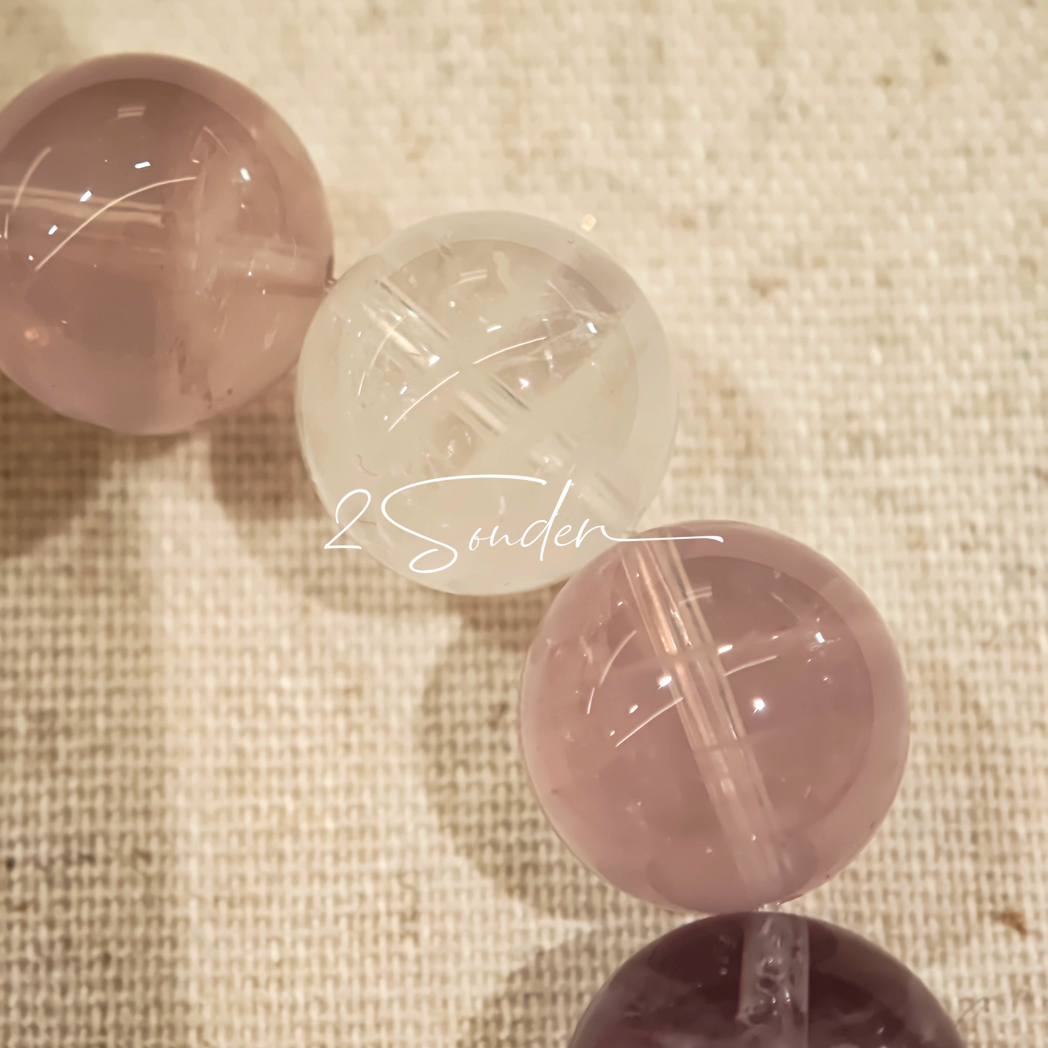 This is a multi gemstone bracelet consists of White Phantom Quartz, Aquamarine, Raw Clear Quartz, Starry Pink Quartz, and Lavender Amethyst.  The colors are close to pastel shades, making them perfect for spring and summer wear.