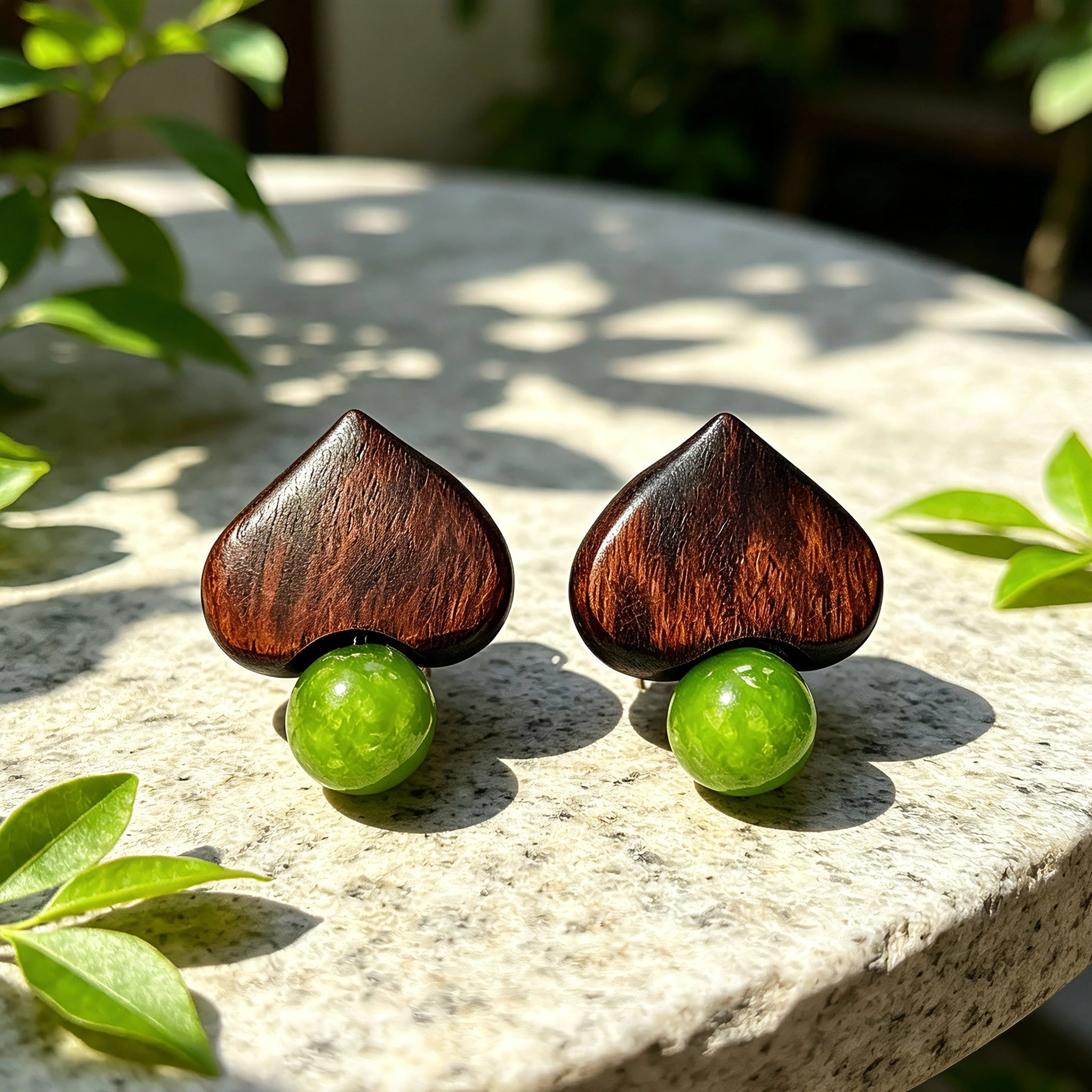 Crafted with dark wood heart‑shaped pieces paired with vivid green grape‑tone stone beads. This stud earring blends retro natural texture and fresh color contrast. It delivers a unique boho‑charm look for daily wear.