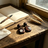 Crafted from vintage‑style dark wood, these drop earrings feature delicate small white flower accents with golden centers. Natural wood grain brings warm retro texture, suspended by black knotted cord for a soft boho‑charm look. They are lightweight statement pieces perfect for daily and casual styling.